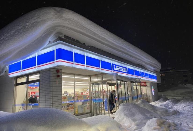 Lawson convenience store blanketed in snow.