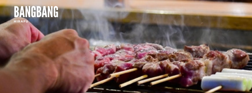 skewers being grilled