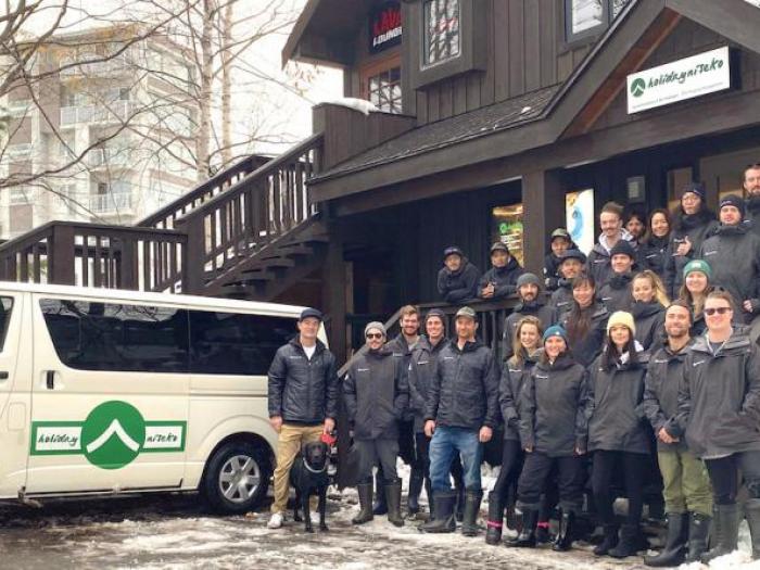 Holiday Niseko staff in standing infront of office