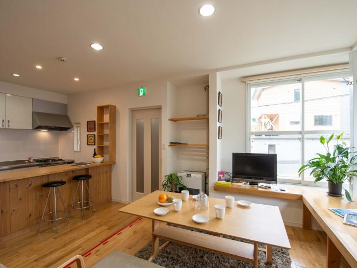 Green House - small chalet living area with dining table small chalet living area with dining table