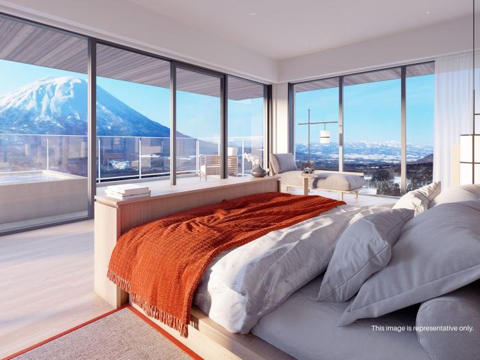 Niseko Kyo Penthouse A large bedroom with expansive views of Mount Yotei
