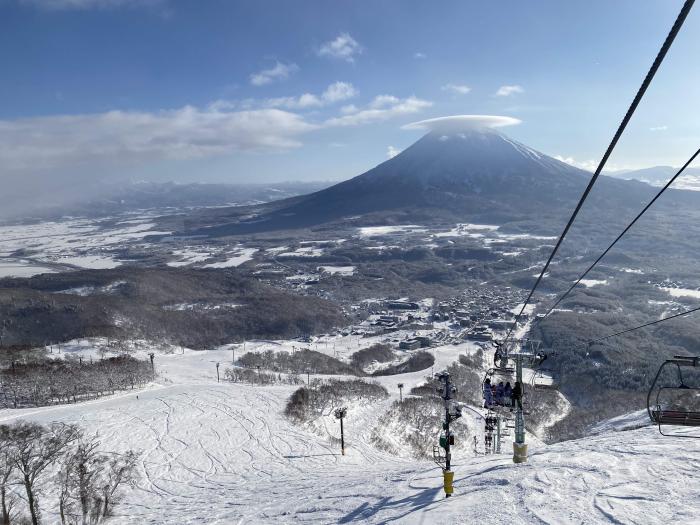 A view down center 4 chairlift with Mount Yotei behind