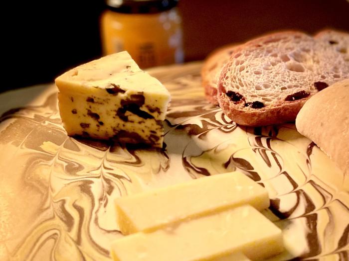 Cheese and bread on a chopping board