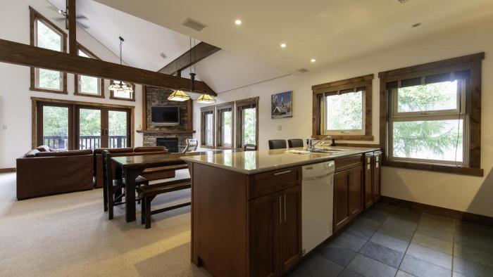 Kitchen bench and dining table behind