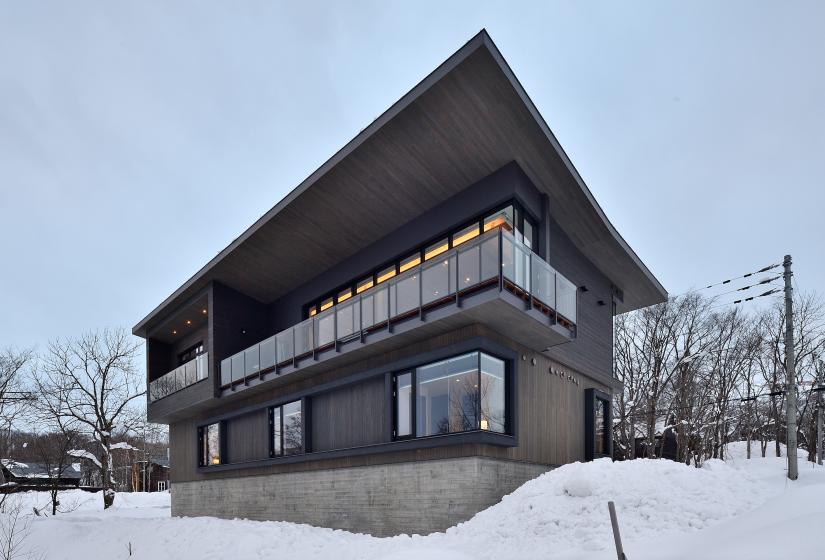 exterior of building in winter with snow piles