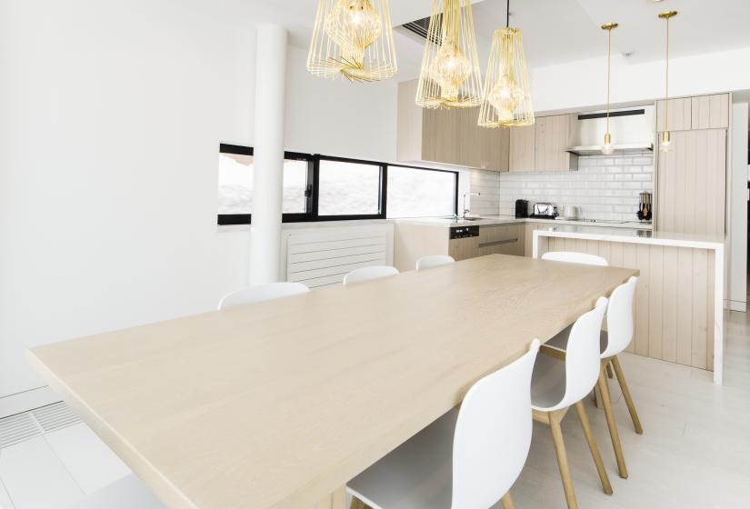 dining table in front of the kitchen