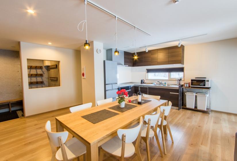 dining table set in front of kitchen