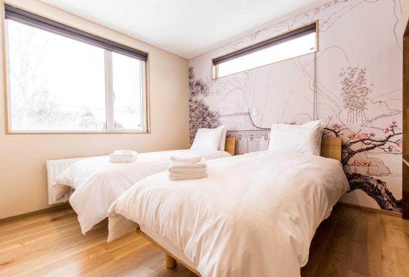 bedroom with cherry blossom wallpaper 