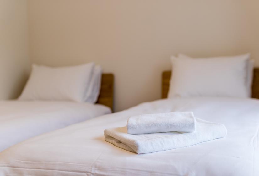 Lodge Mori folded towels on beds