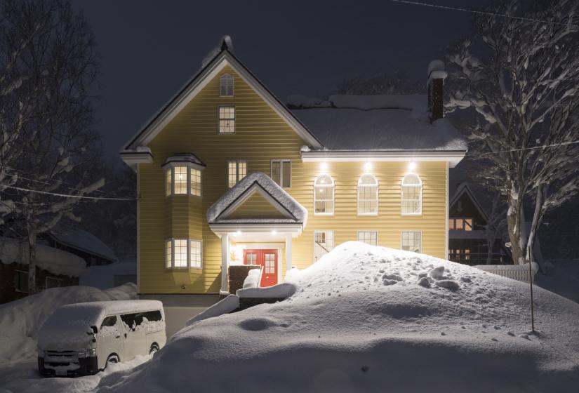 Exterior snowy view of house