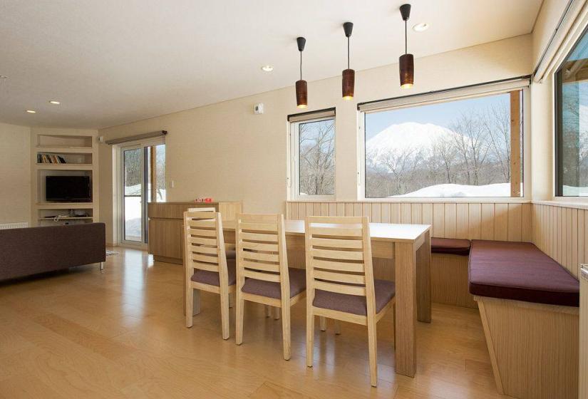 dining room with view of yotei in winter