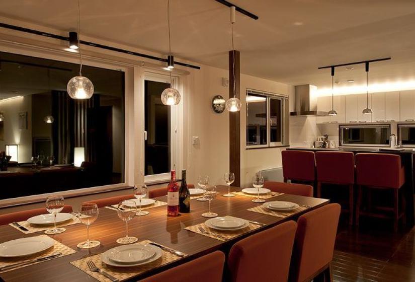 dining area with wine boutique lighting and exterior windows