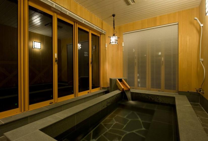 Japanese style bath with wood trim and large windows