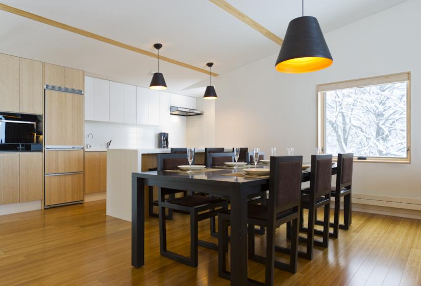 dining table in front of the kitchen