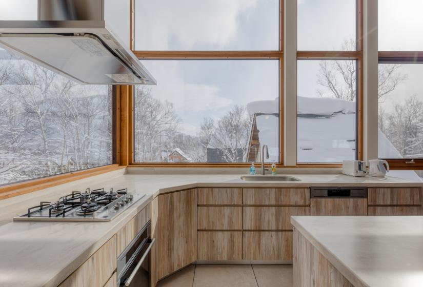 kitchen with large window views in winter