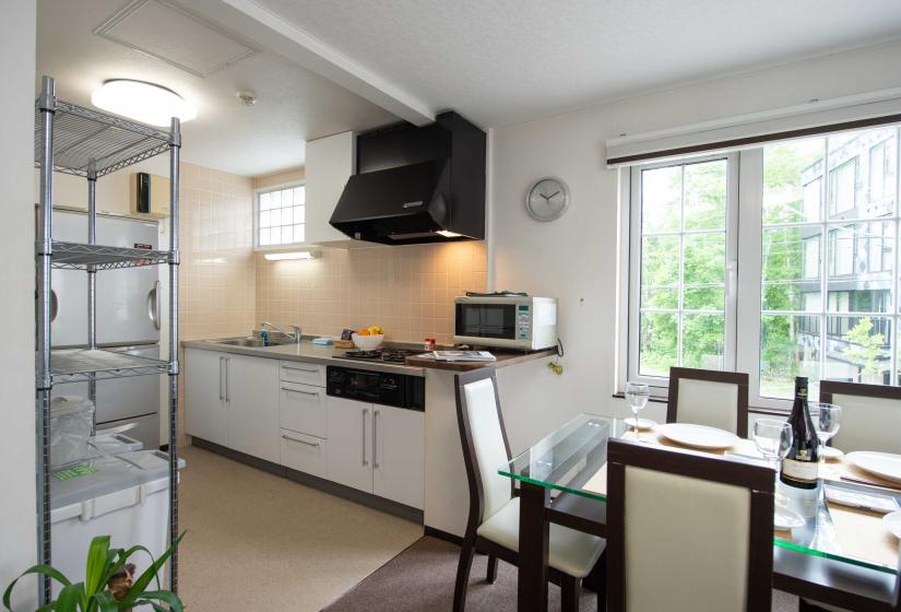 dining table with kitchen in background