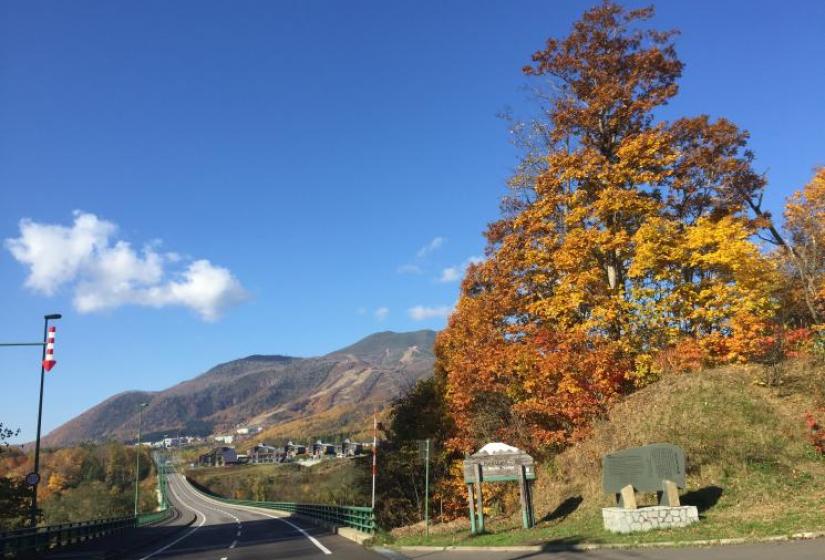 The road to Hirafu The St Moritz bridge with Hirafu ski area in the back ground