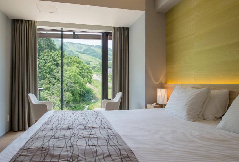 Double bed with forest view