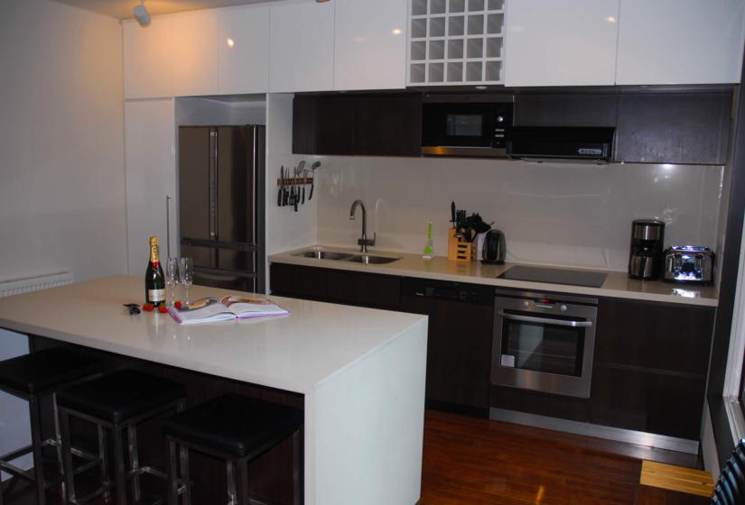 Kitchen with island bench and kitchen sink