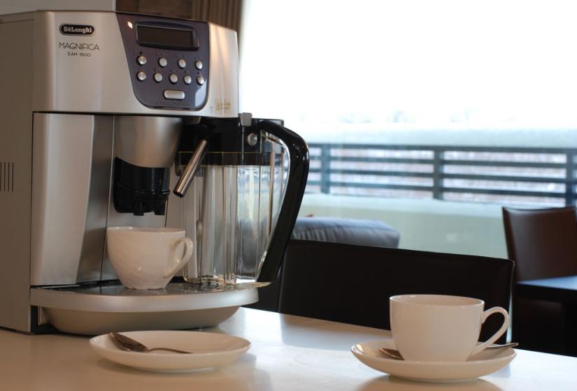 espresso machine with coffee cups and balcony