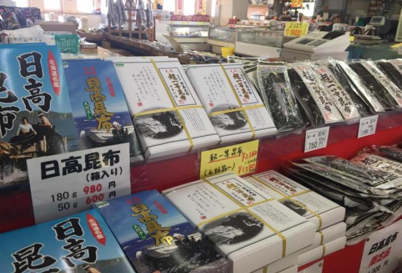 Shelves lined with seaweed souvenirs