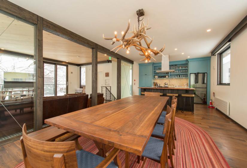 dining table with wooden sculpture chandelier