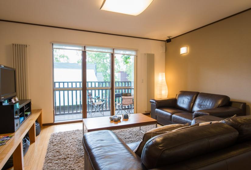 Living area with view to balcony