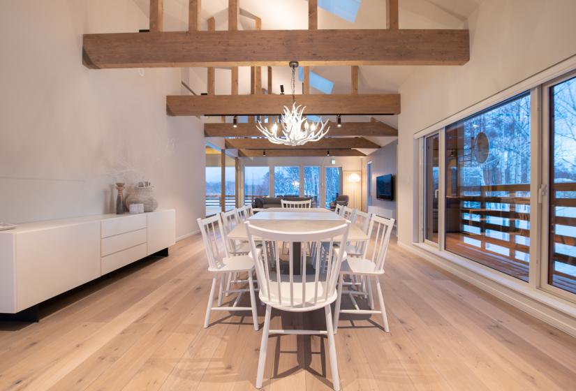 Dining table and chairs with vaulted ceiling