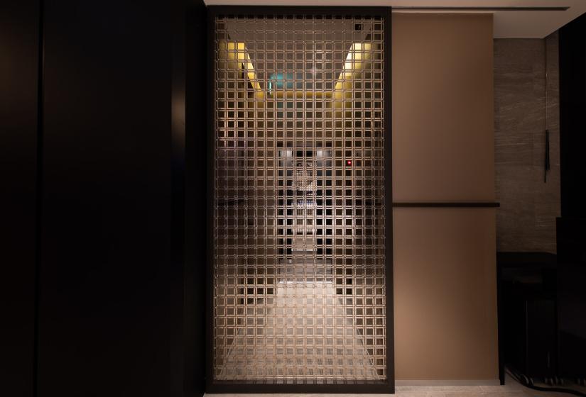 A woven mesh steel door