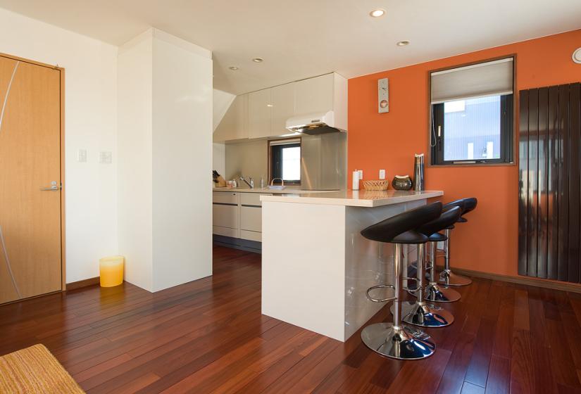 kitchen counter with black bar stools 