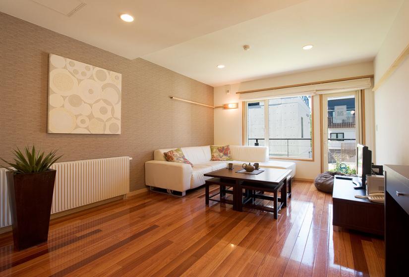 Living room with wooden floor and brown coffee table