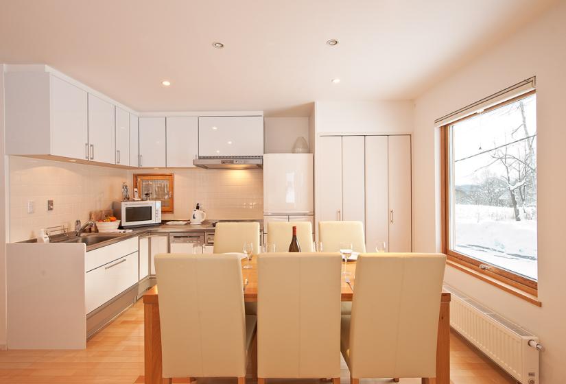 White kitchen and dining table