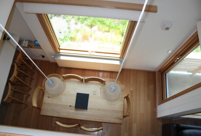 view of dining table in open-plan living area from 3rd floor