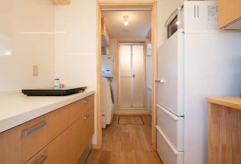 Kitchen view with white fridge 