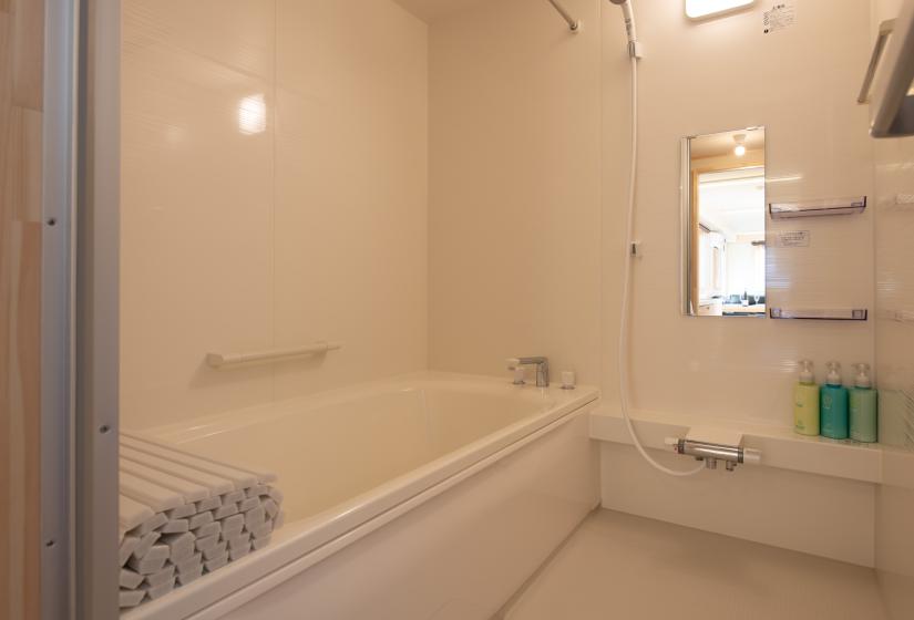 White bath tub and shower