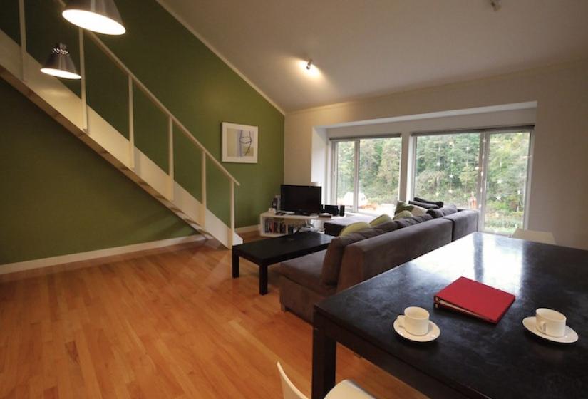 living area with view of staircase 