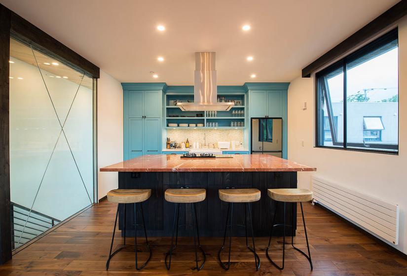 kitchen with bar and stools