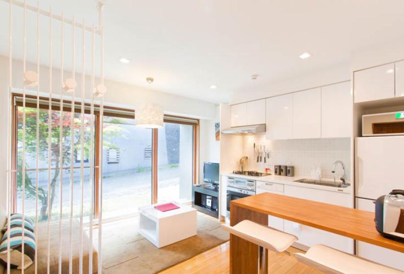 studio kitchenette with bar and stools