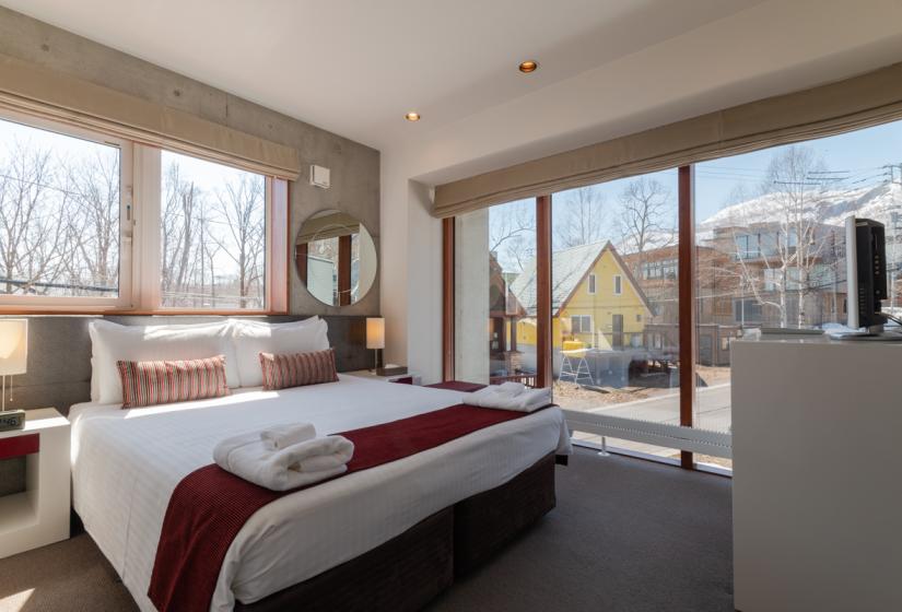 main bedroom with large window views