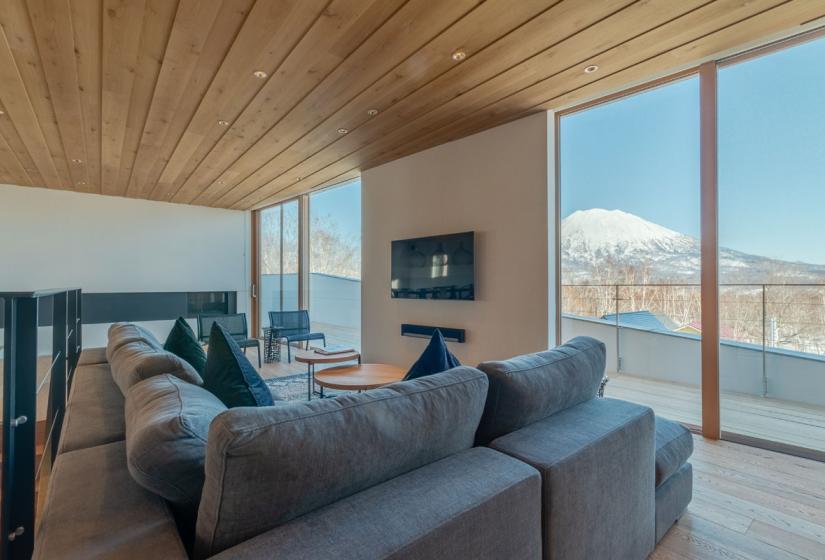 couch with TV and views of Mt. Yotei