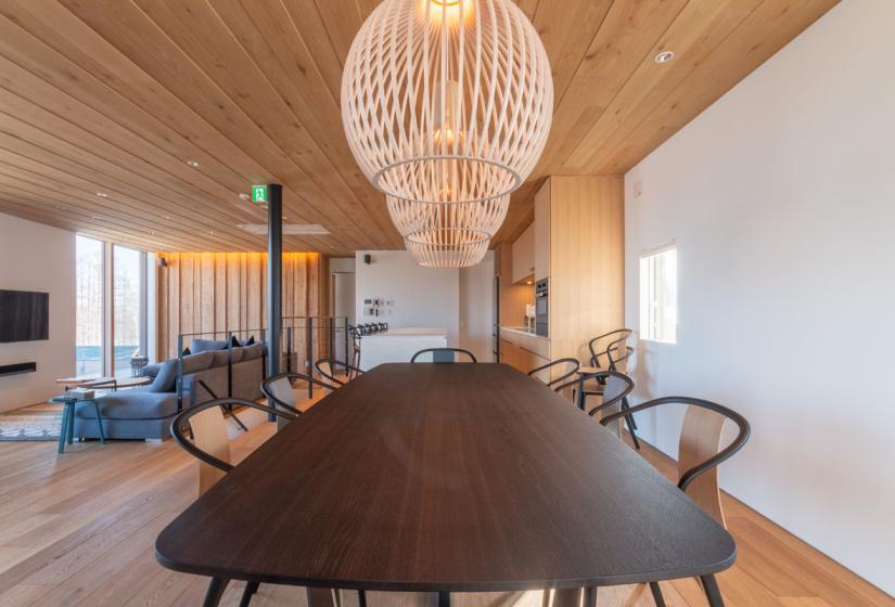 chandelier over dining table in main living area