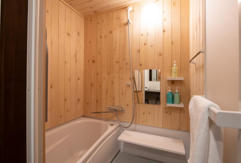 bathtub with hinoki wall panels