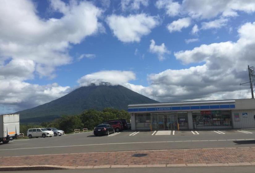 Couldn't ask for a better view Lawson convenience store wit Mt Yotei in the background