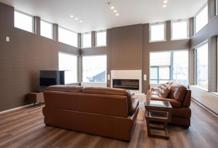 Mountain Butterfly Lounge Living room view of brown sofa
