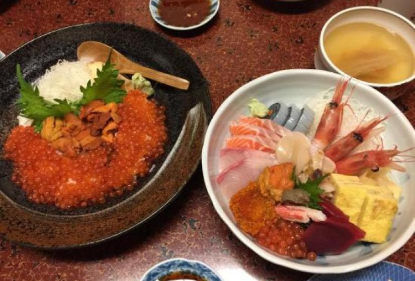 Delicious sushi awaits Several plates of delicious colourful sushi