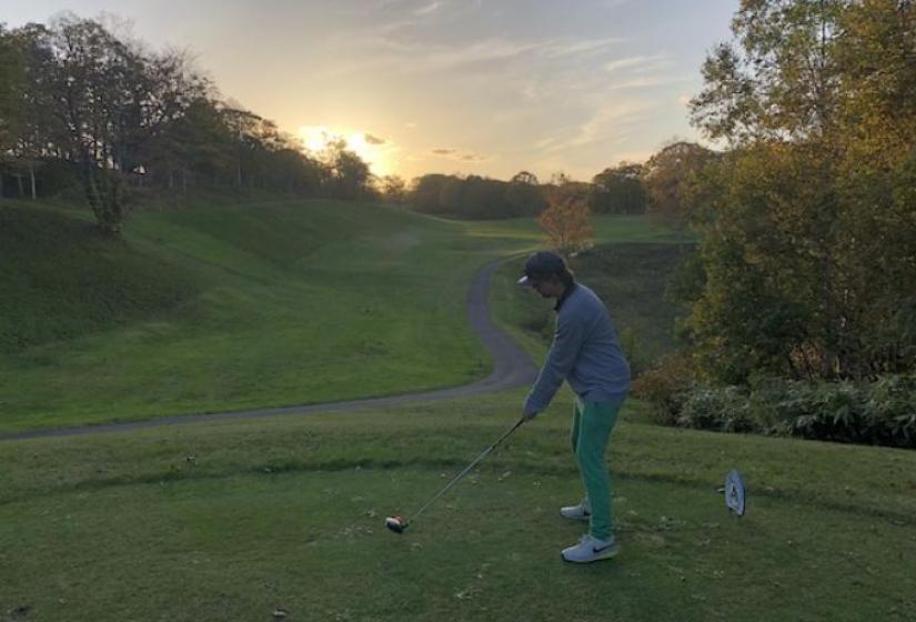 Niseko Golf and Resort at sunset A golfer tees off into the sunset