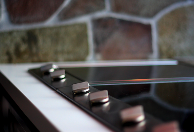 stovetop with stone wall