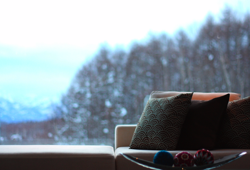 couch with trees in background