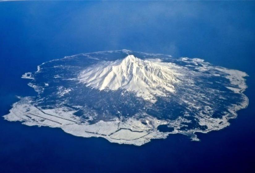 Rishiri isalnd in the winter A snow covered Rishiri Island from the air
