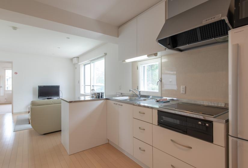 Kitchen and breakfast bar with views out the windows 